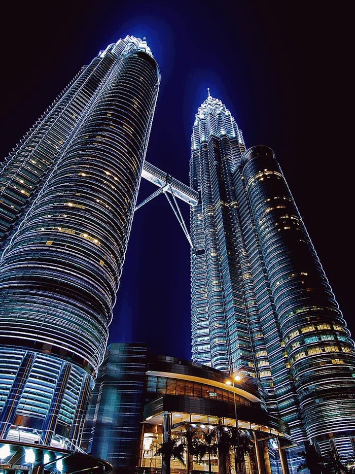 pexels photo 1580112 Stunning nighttime view of the illuminated Petronas Towers in Kuala Lumpur, Malaysia.